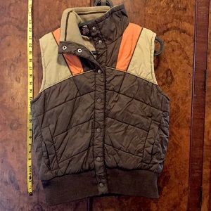 Puffy, retro brown, orange, and tan vest